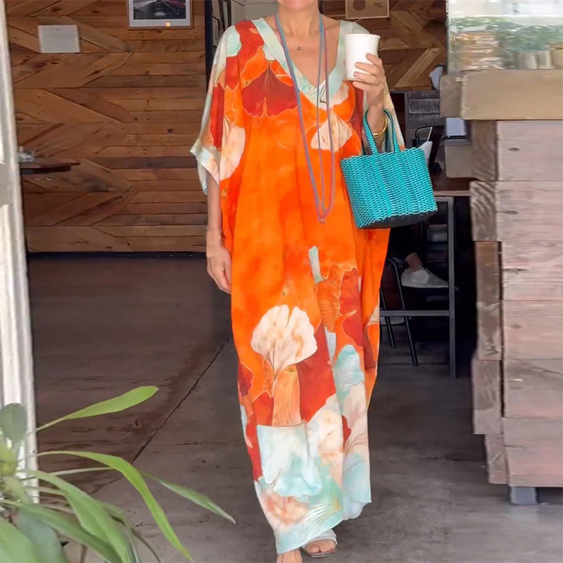 Loose, long dress with floral pattern and half-length sleeves - Image 3